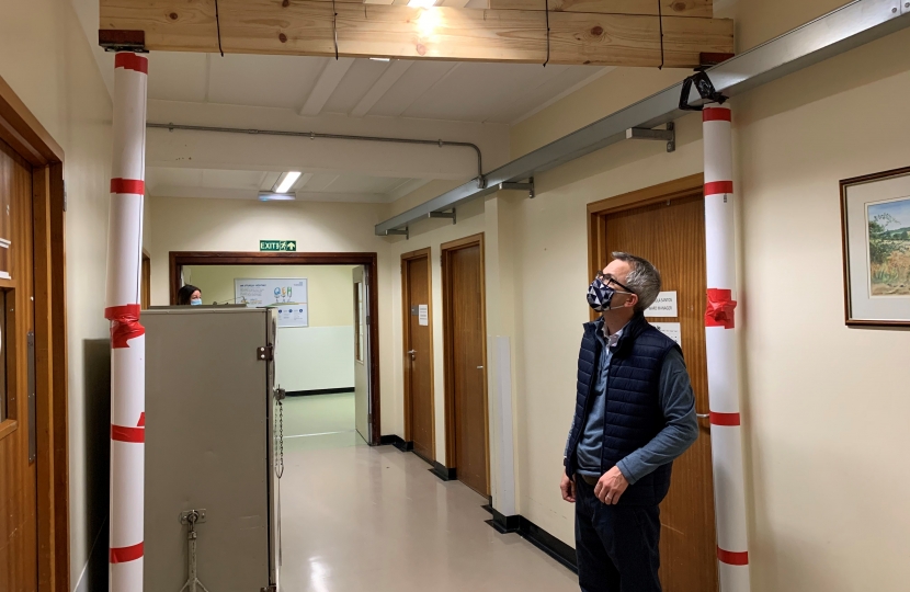 James inspecting props holding up roof at QEH