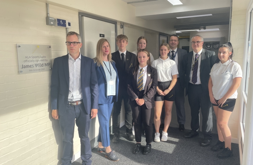 James with students after opening the new Sports Suite